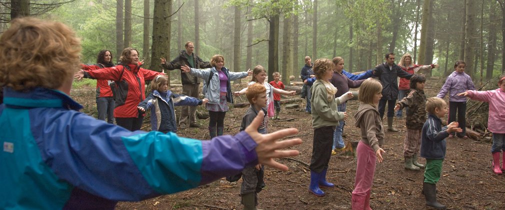 School children learning in the open forest