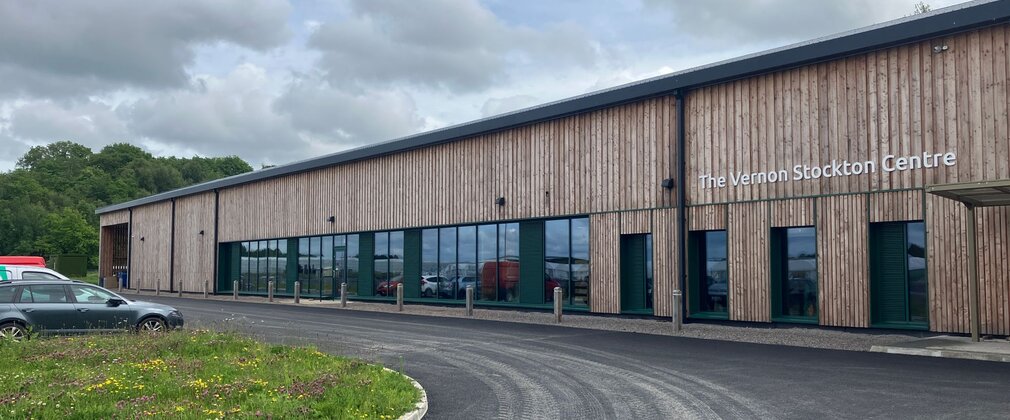 A modern, timber-clad building.
