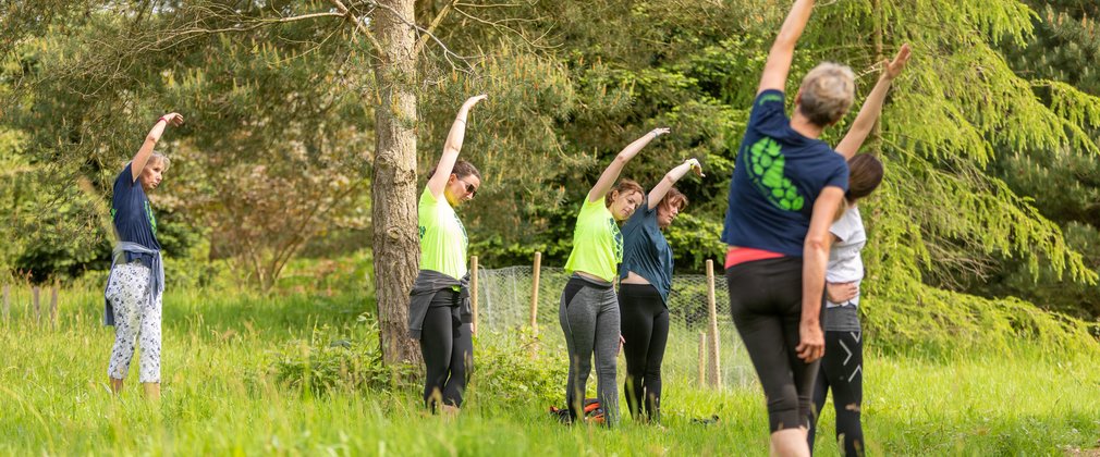 Bedgebury Forest Runners stretching in spring