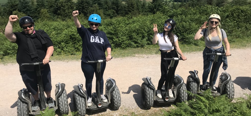 family enjoying a segway adventure in the forest