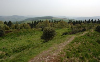 The ramparts at Bury Ditches Iron Age Hill Fort. The Marches.