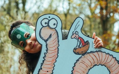 Girl in mask with Superworm