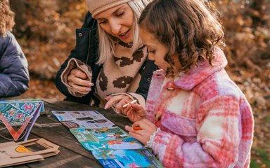 Woman and girl looking at Zog trail pack