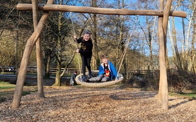 kids on a swing