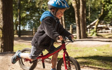 Little boy cycling