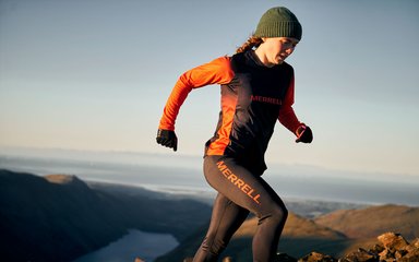 Georgia Tindley running on a trail