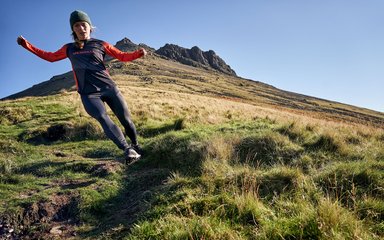 Georgia Tindley running on a trail