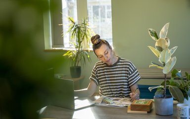 woman concentrating on work in an office