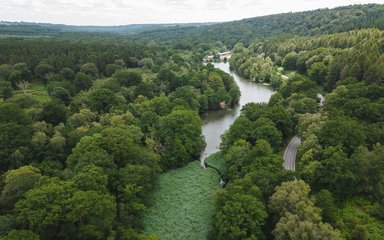 Aerial image of Cannop Ponds, surrounded by forest