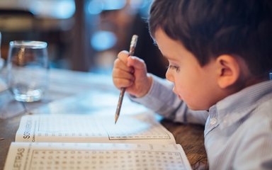 child with puzzle