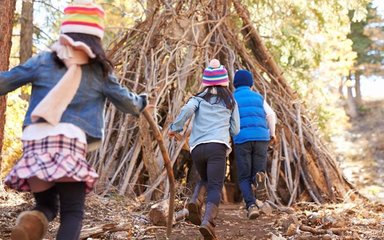 Children building shelter 