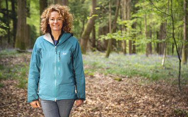 Kate Humble against a bluebell woodland backdrop