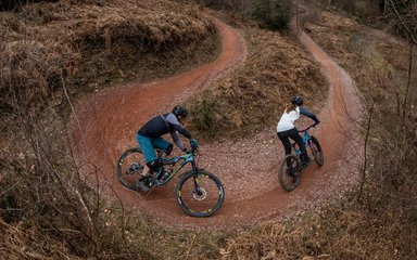 Two mountain bikers on corner