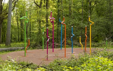 12 coloured, metal, vertical sculptures