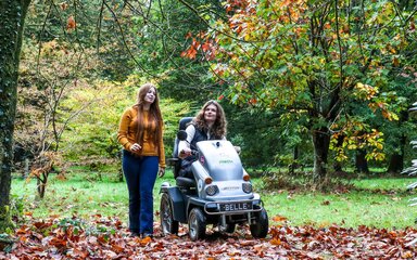 A family enjoying Autumn colours at Cryil Hart Arborteum including Tramper mobility scooter use