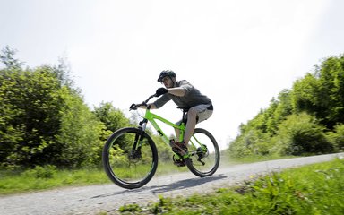 Man cycling at Hicks Lodge