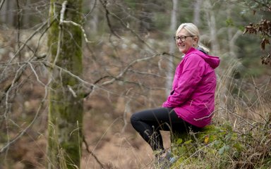Dilly sitting in the forest