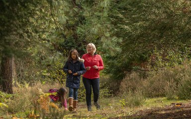 woman and child in the forest