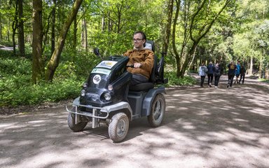Man using an off-road mobility scooter
