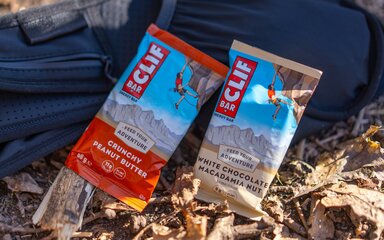Two Clif bars on forest floor