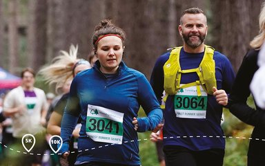 Runners in blue at Forest Runner event