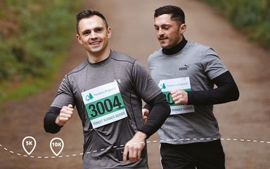 Two men running at Forest Runner event
