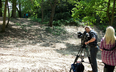 Crew filming in the forest