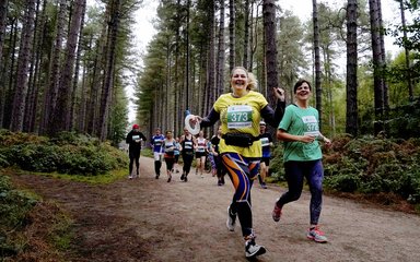 People running at Forest Runner event