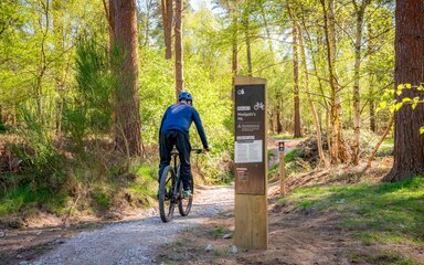 Cyclists rides towards madgetts pit