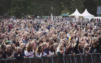 View of crowd from the stage of an outdoor concert