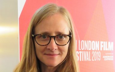 Artist Ruth Maclennan with blonde hair and glasses