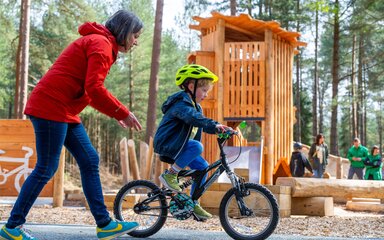 boy rides his bike at Pedal and Play 