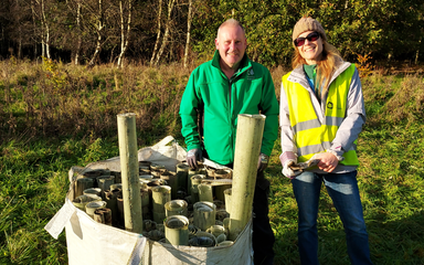 Two Forestry England volunteers working