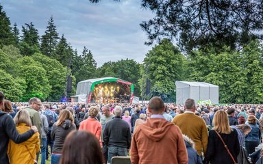 People watching Forest Live event from distance 