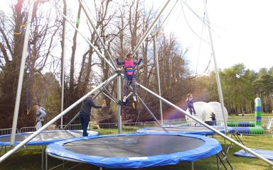 Child jumping on trampoline 