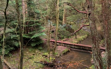 Man made dam across river