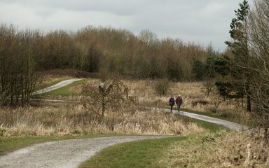 A couple walking at Viridor Woods in the north west
