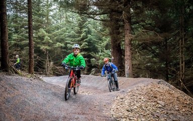 children cycling on family friendly trail