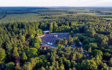 Aerial view concert outdoors in a forest