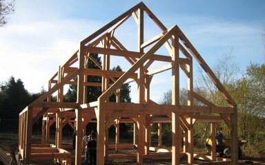 The timber frame of a house.