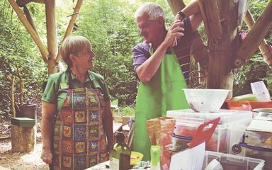 Community volunteers cooking 