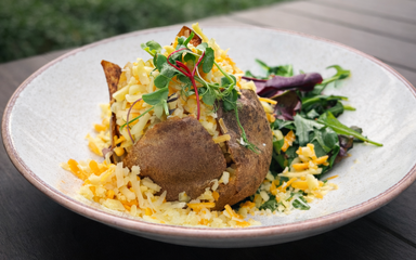 Jacket potato with cheese and salad