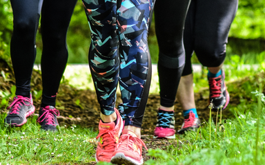 four pairs of legs and feet running