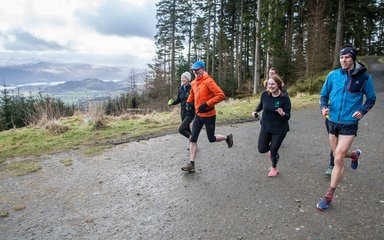 group running in Whinlatter