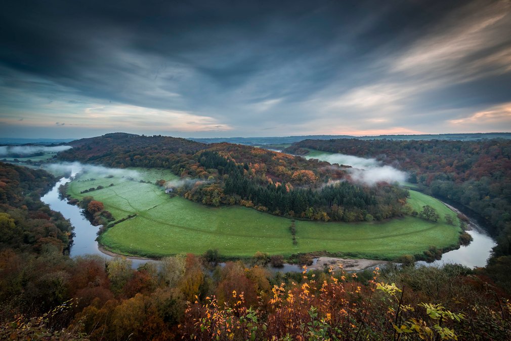 Sunrise over Symonds Yat with mist in the valley
