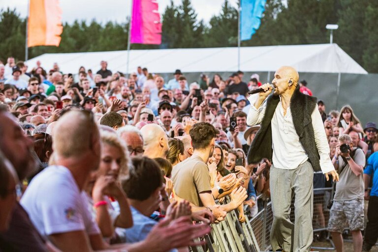 James performing at Cannock Chase Forest